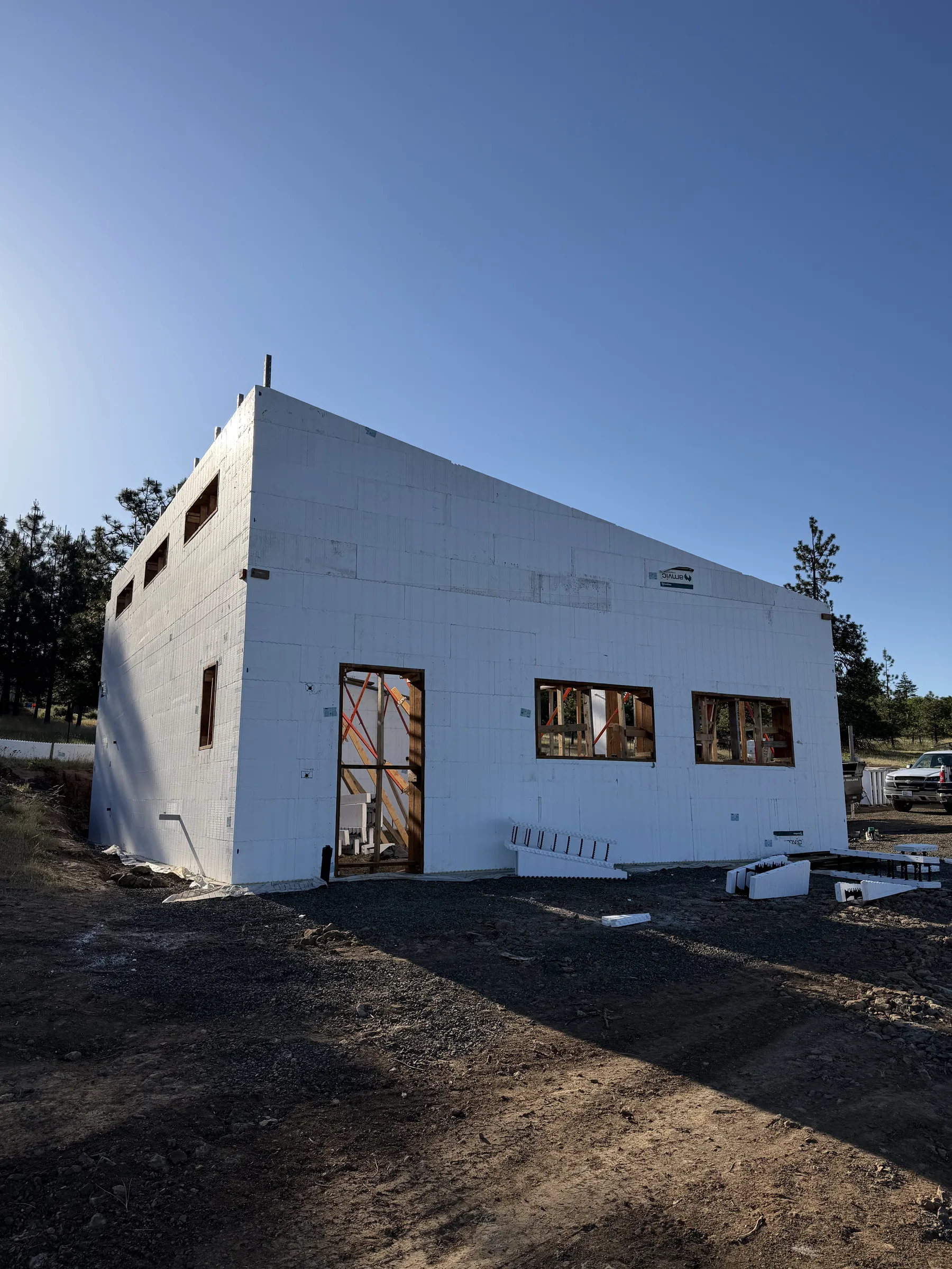 Morning light across freshly stacked ICF block