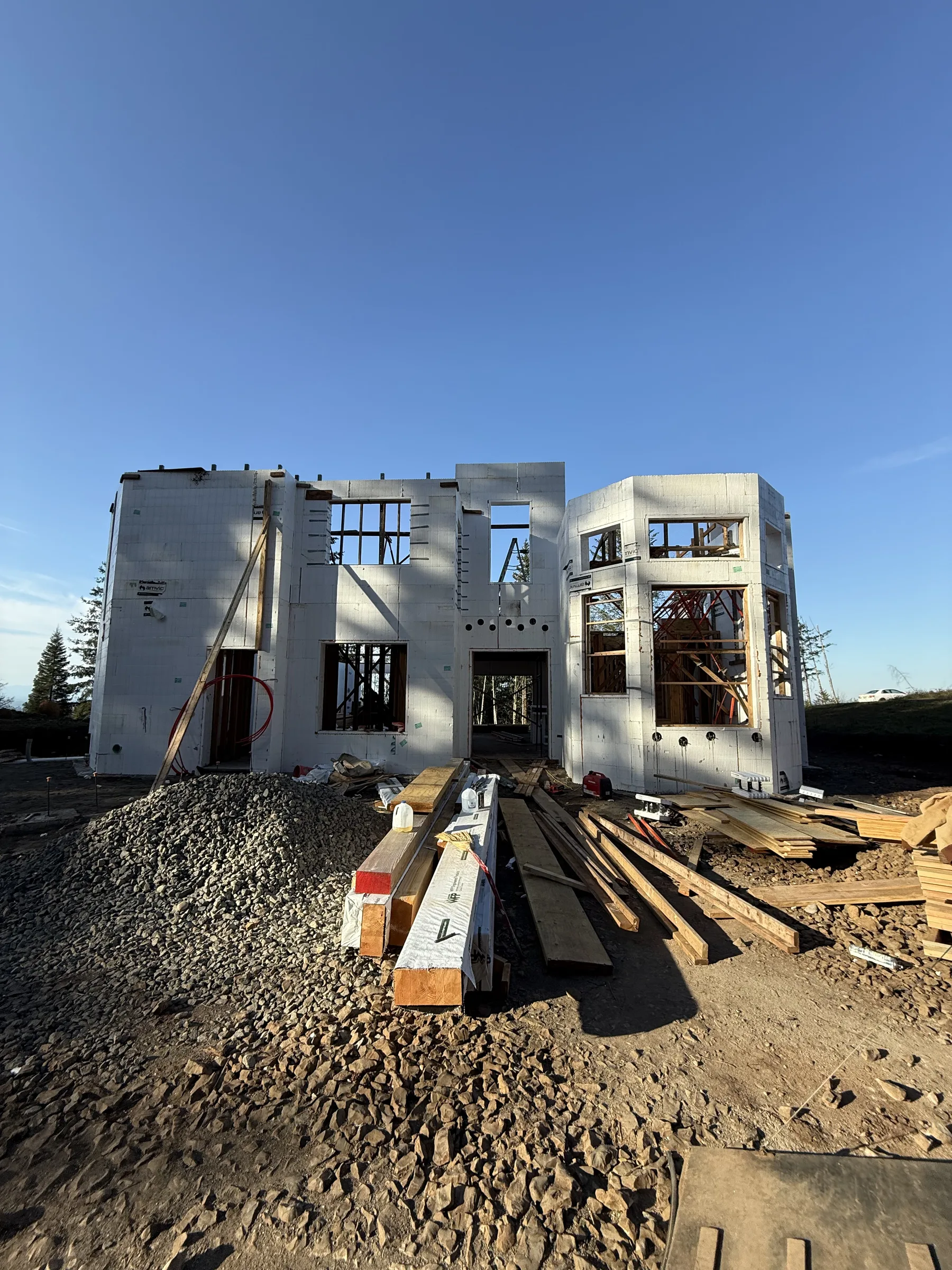 Tall two-story ICF wall face with door and window openings