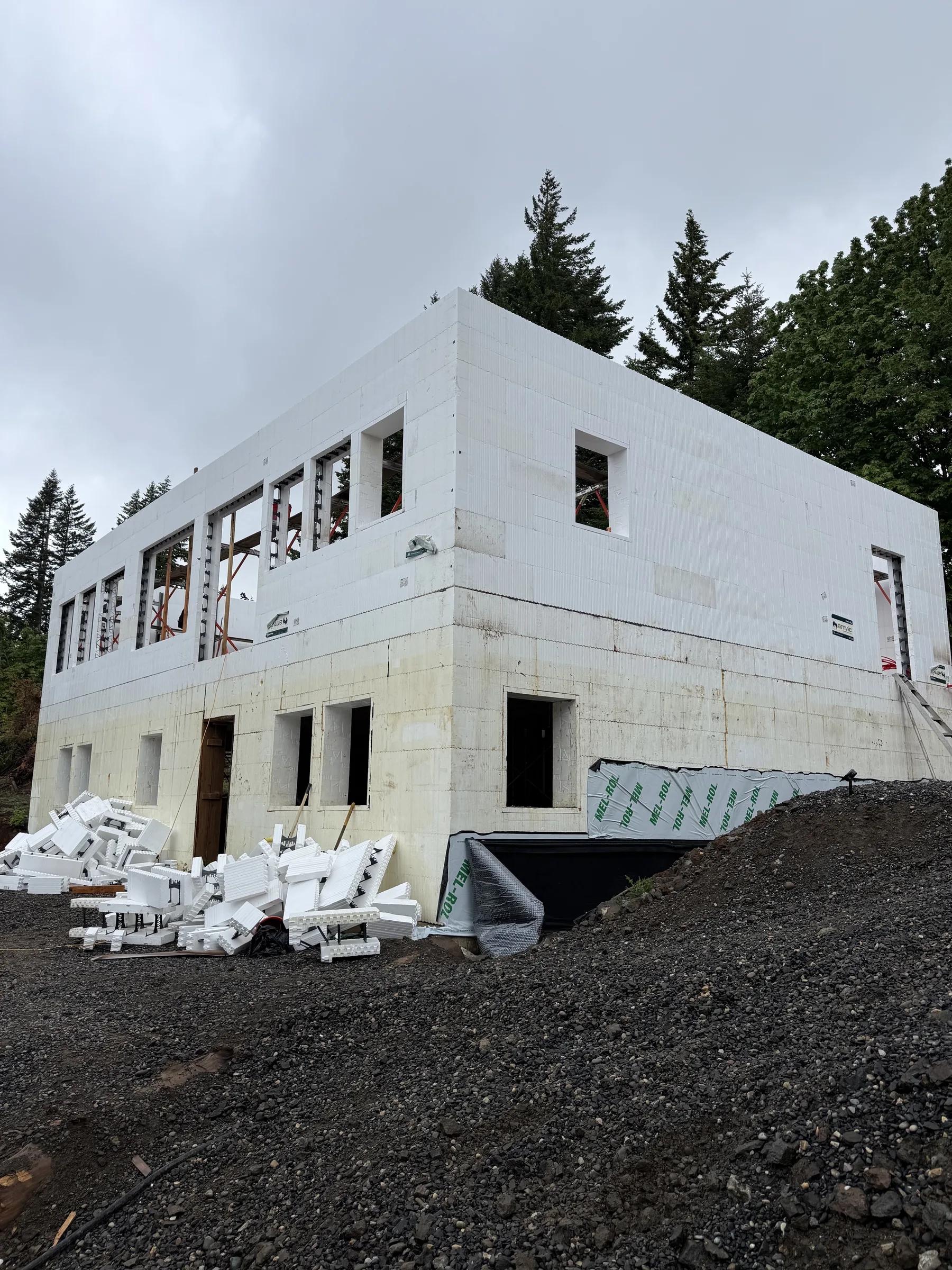 Two-story ICF shell with second-story window bucks