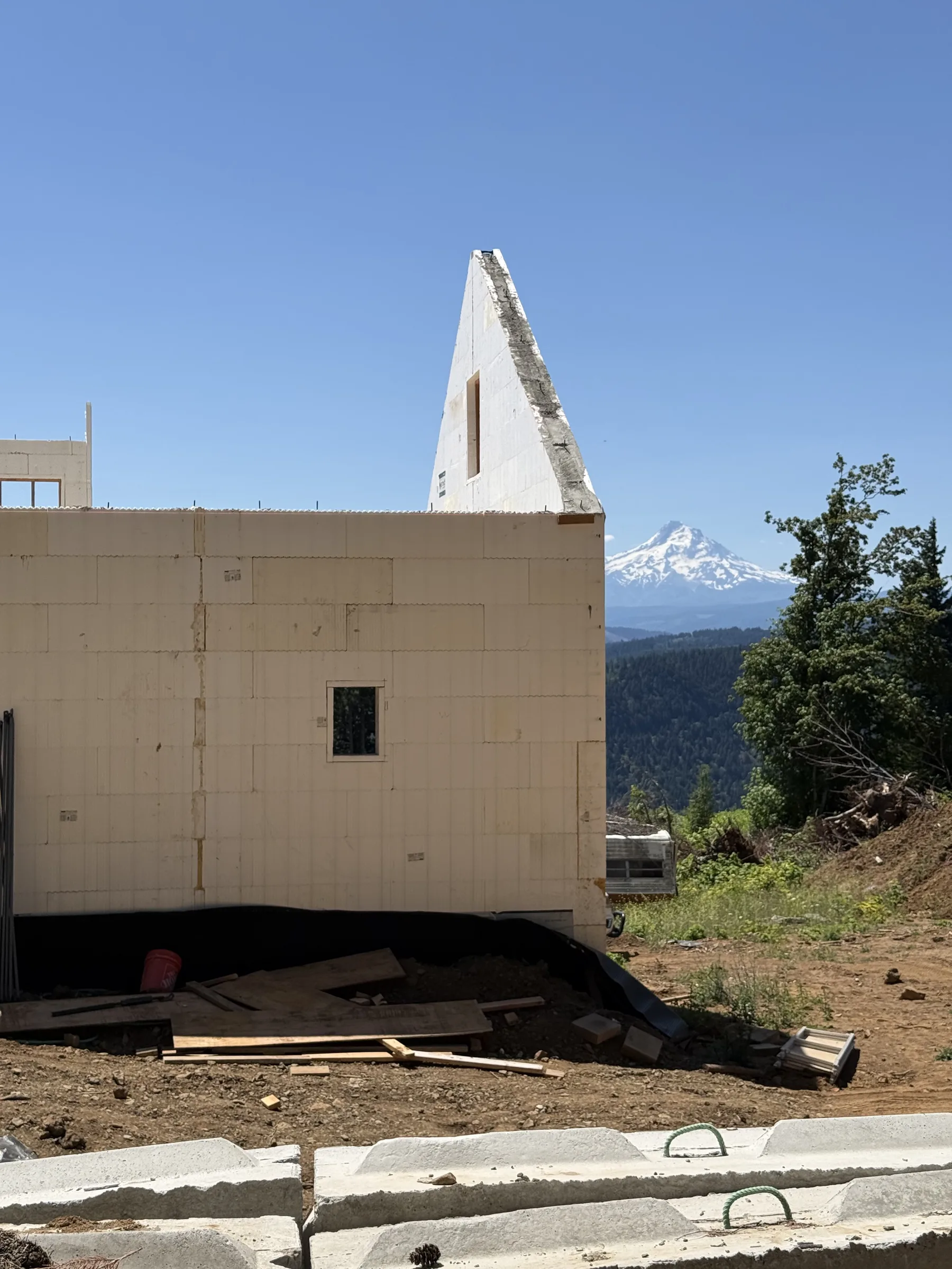 ICF gable wall standing with snow-capped Mt Hood framed beside it